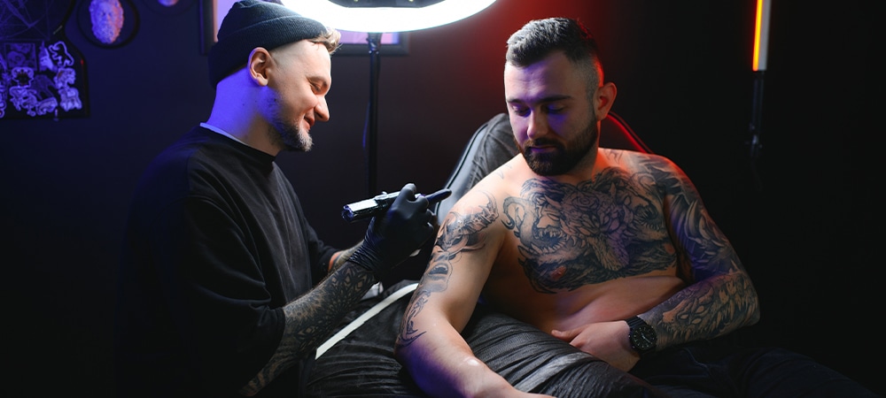 sleeve tattooing on tattoo shop