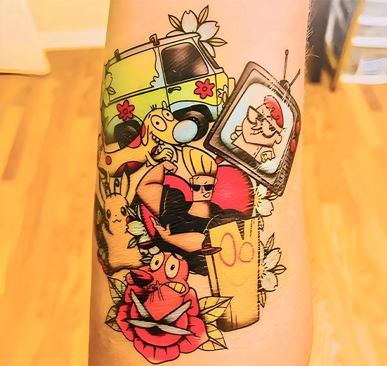 90s cartoon tattoos on arm