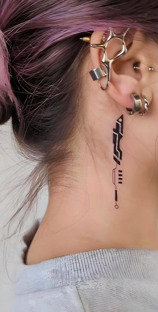 behind girl ear minimalist fine line tattoo