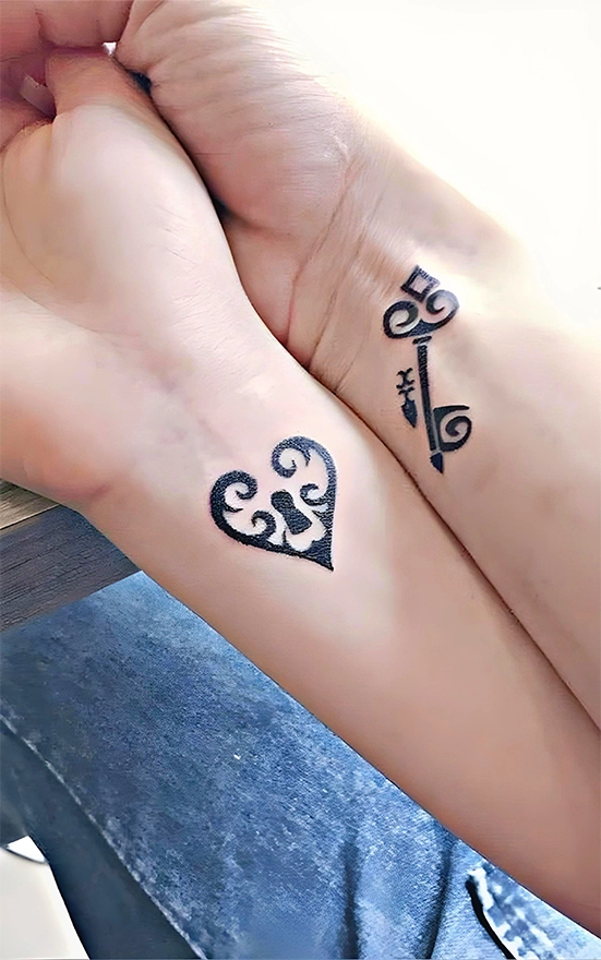 couple connection tattoo