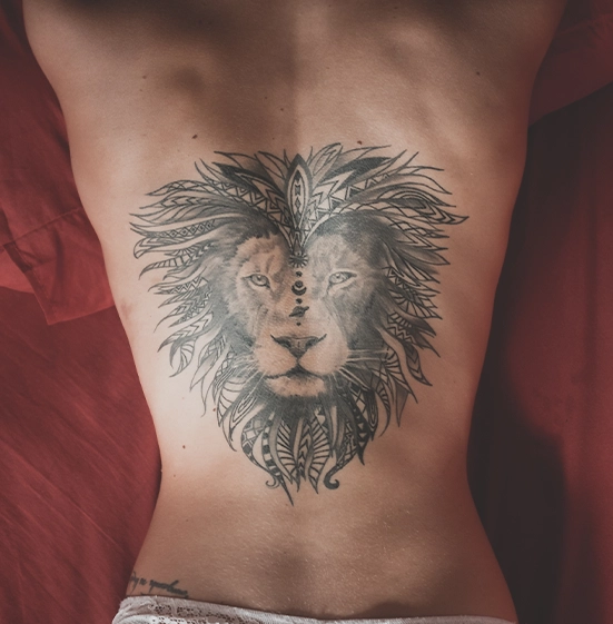 lion tattoo on girl back