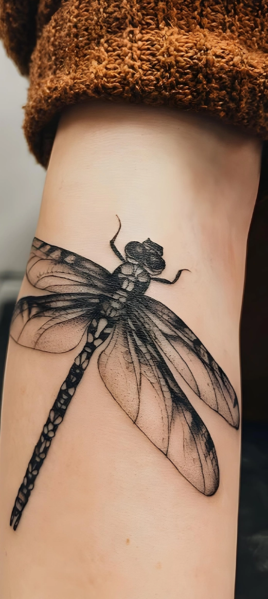 minimalist dragonfly / animal tattoos on girl arm