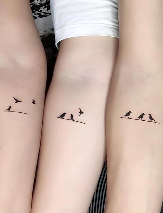 3 siblings matching tattoos on arms