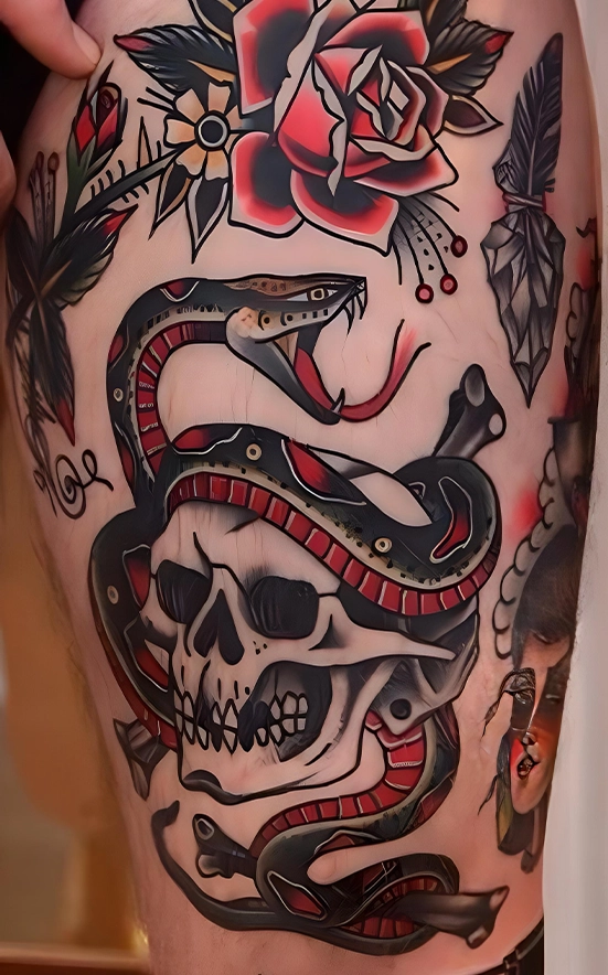 snake and skull tattoo on women leg