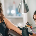 girl getting first time tattoo